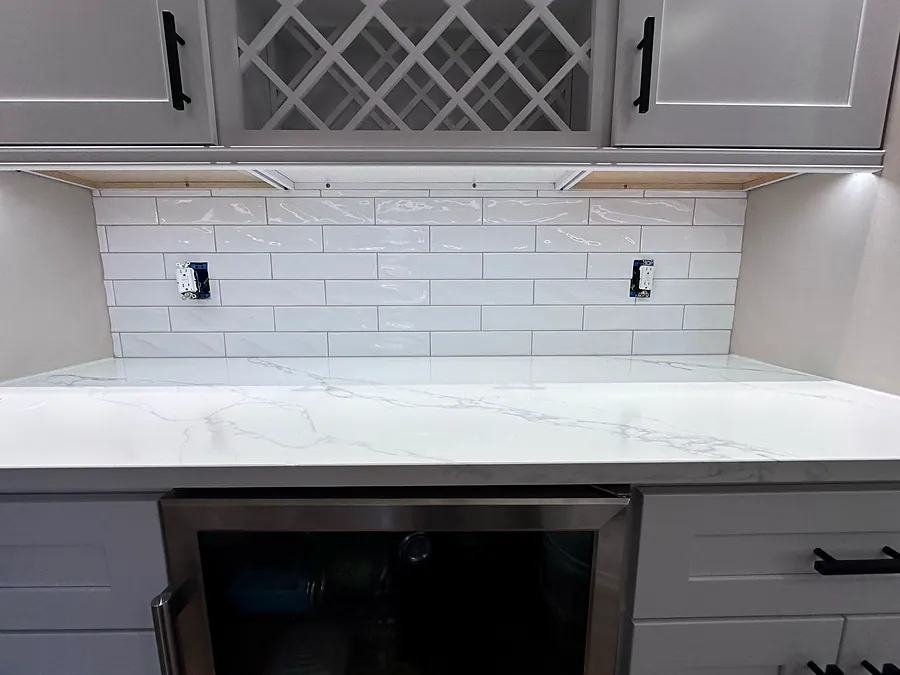 Full backsplash to the underside of the cabinets